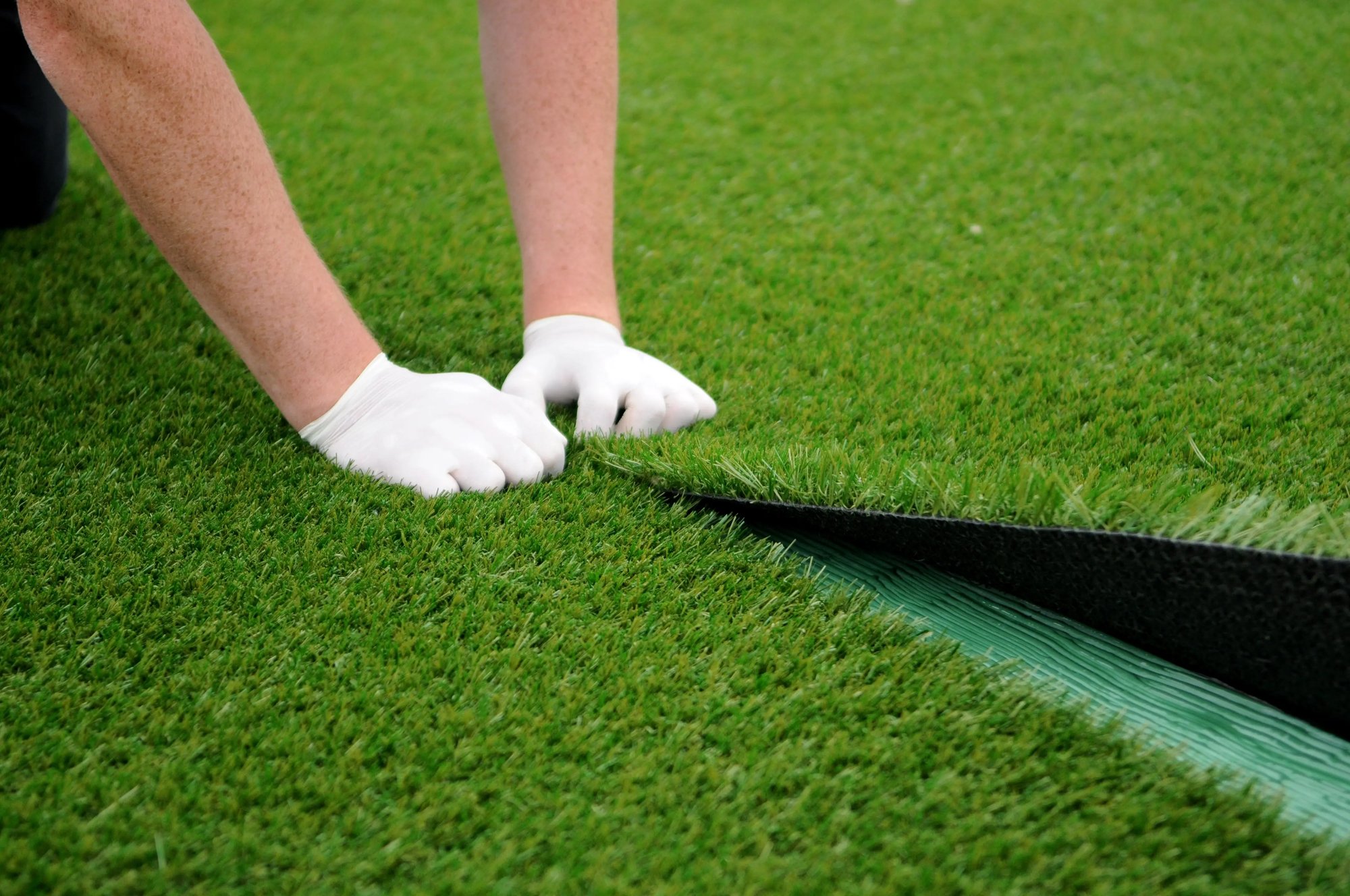 fixing the seams of the turf together fixing the seams of the turf together