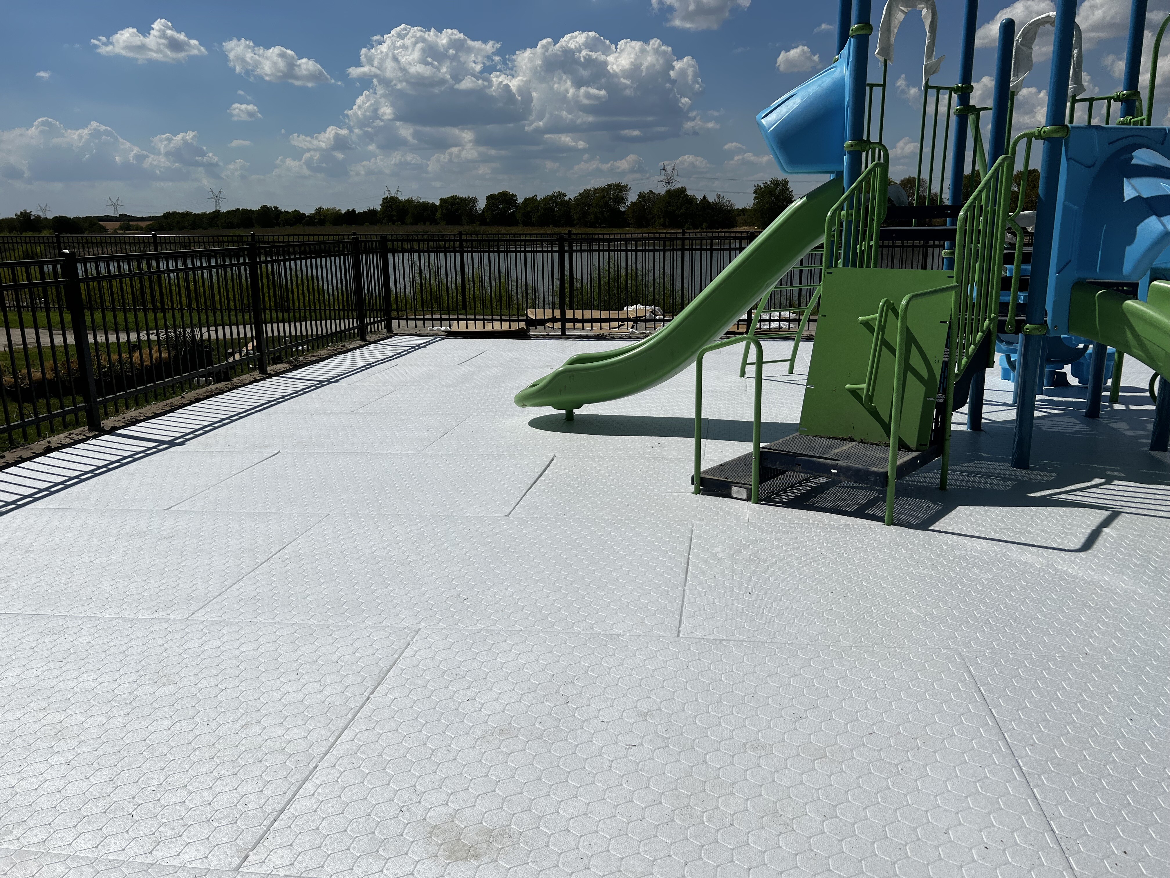 brock pad installed on playground